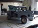 1988 Ford Bronco - This 1988 Ford Bronco is in a garage with its hood and doors open, appearing to be prepped for work.