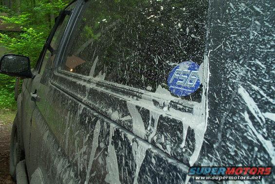 Mud-splattered SUV side with FSB sticker