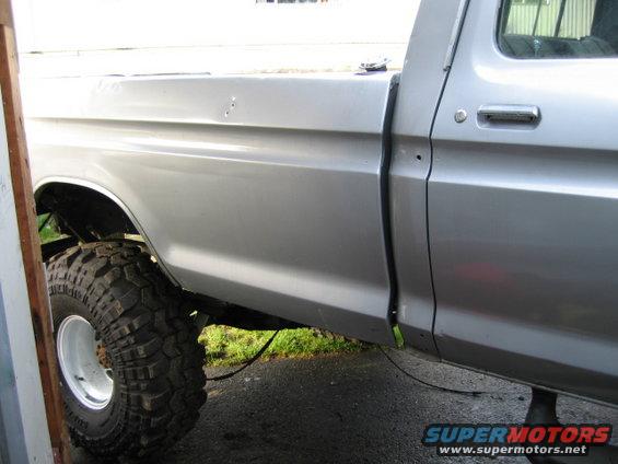 Silver 1976 Ford F-150 side view with large tires