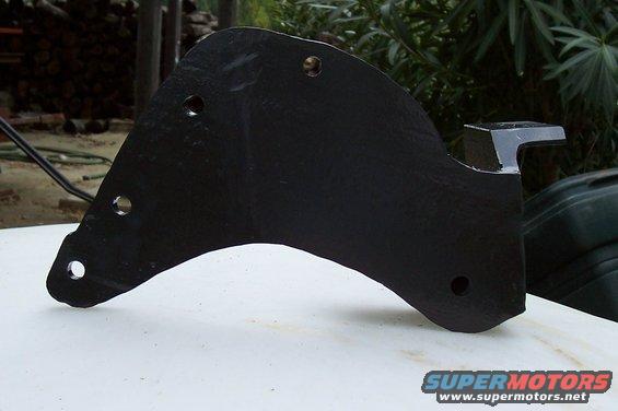 Black metal bracket with multiple bolt holes and a mounting tab