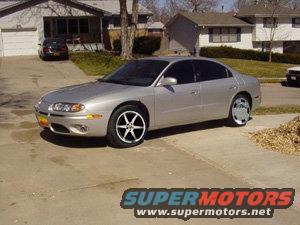 2002 Oldsmobile Aurora sedan parked in driveway