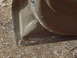 1979 Ford Bronco - Close-up of a corroded vehicle door corner, indicating wear and tear.
