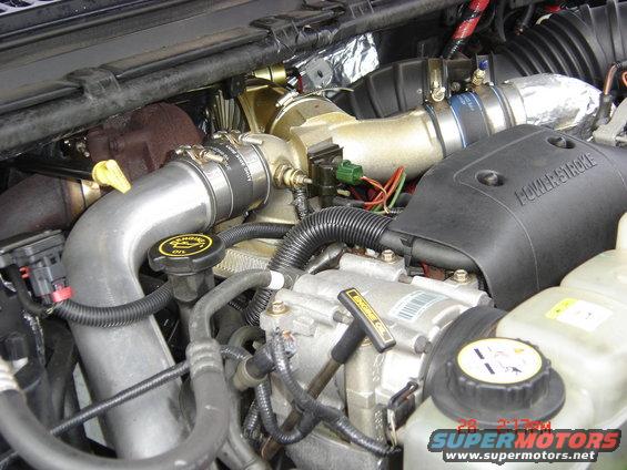 Powerstroke engine with turbocharger and hoses