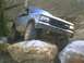 1991 Mazda Navajo - This SUV is navigating a rocky trail, showing off its off-road capabilities.