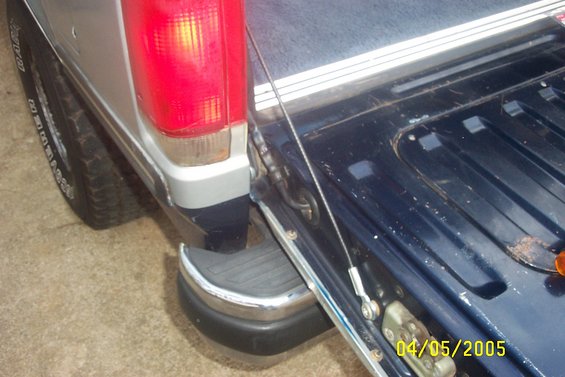 Pickup truck tailgate and taillight with date stamp 04/05/2005
