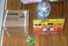 1988 Ford Bronco - A CO2 tank and a REHVAC regulator and blowgun kit are displayed on a wooden floor.