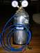 1988 Ford Bronco - A carbon dioxide tank is shown with two pressure gauges and a blue hose attached.