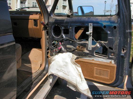 truck-pictures-001.jpg Remove the door panel and speaker. DO NOT remove the plastic trash bag. It's a moisture barrier so don't take it out.  During some of the install, you may need a second set of hands so get a buddy ready.