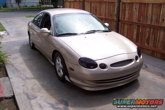 Gold 1998 Mercury Sable sedan, 3/4 front view