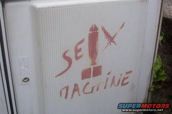 thing spraypainted on the side of a utility box in France