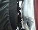 1987 Ford Bronco - A close-up view of a spare tire and rope, possibly for off-road recovery, is visible.