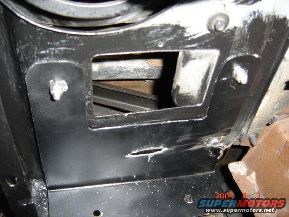 Bracket to relocate charcoal canister under pass side headlight and reinforce rusted metal where the front of the inner fenderwell bolts up.