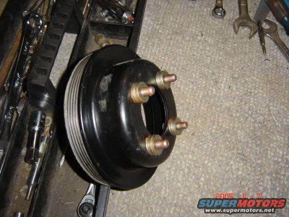 crank-pulley-spacers.jpg Spacer for crank pulley to line it up with the rest of the pulleys.  5 washers, looking into having a billet spacer made.