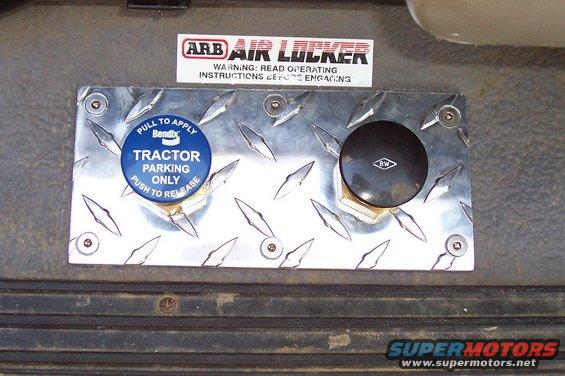Diamond plate panel with ARB Air Locker sticker and Bendix tractor parking brake control knob
