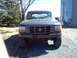 1993 Ford Bronco - Front view of a 1993 Ford Bronco parked outdoors.