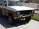 1986 Ford Bronco II - This 1980s Ford Bronco II shows significant rust and damage to its front end.