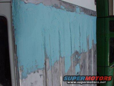 The pretty blue bondo covering the whole width of the truck. 