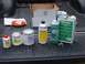 1995 Ford C-350 (Centurion Conversions) - The results from the trip to the paint store, From Left to Right, Hardner, Color paint, Primer, Reducer, Acid Etching Primer, and Thinner.