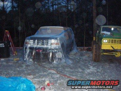 all-covered.jpg The truck covered w/ paper near the paint surfaces and further away with some thin plastic. 