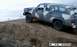1979 Chevrolet Suburban - This 1979 Chevrolet Suburban is shown off-road, navigating a steep dirt incline.