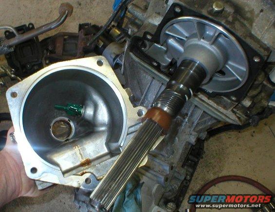 02-tailoff.jpg Tailhousing removed.  With the transmission tilted up, no fluid was lost, and the gasket remained intact.