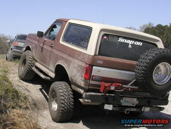 05.jpg CSN.Rebel flexing his six inch suspension lift and thrity-fives.