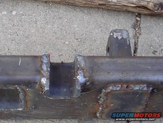 Welded metal part with Supermotors.net logo