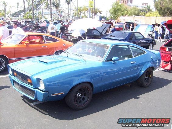Blue 1975 Ford Mustang II coupe with hood scoop