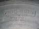 1983 Ford F-250 - Close-up of a tire sidewall displaying size and rim information, along with a pressure warning.