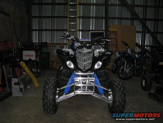 Handmade custom front bumper and a-arm skid plates on the Raptor