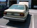 1998 Volkswagen Jetta - Rear view of a beige sedan with its hood open, identified as a 1988 Volkswagen Jetta based on its body style.