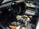 1998 Volkswagen Jetta - Car interior stripped down with wiring and components exposed, showing signs of disassembly.