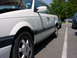 1998 Volkswagen Jetta - White station wagon parked in a lot with other vehicles present.