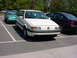 1998 Volkswagen Jetta - A white station wagon is parked in a lot with other vehicles around it.