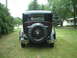 1929 Ford Model A - Rear view of a 1929 Ford Model A sedan showing its spare tire and license plate.
