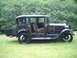 1929 Ford Model A - Side view of a 1929 Ford Model A sedan, showing its interior and rumble seat.