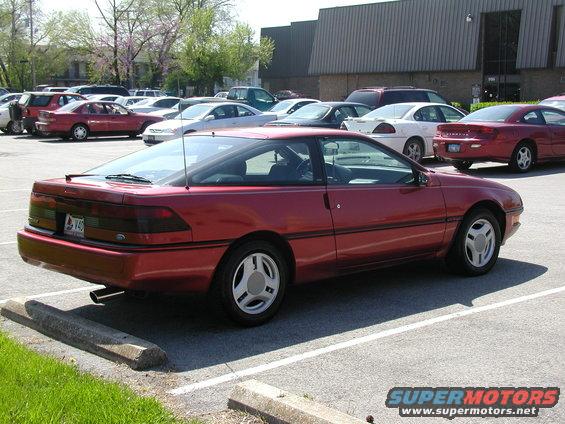 1991 Ford Probe parked in a lot, rear quarter view