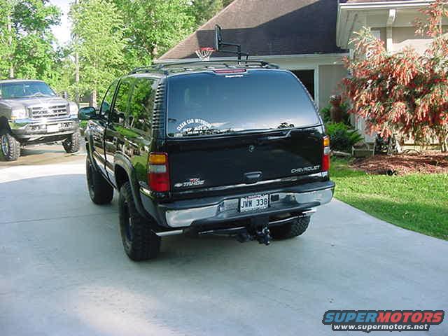 Black 2000 Chevrolet Tahoe rear view with license plate JWH 338