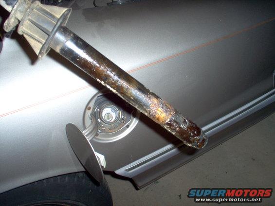 gastank7.jpg The check valve at the bottom of the filler neck was gummed & looked pretty nasty, too.

See also:
[url=http://www.supermotors.net/registry/media/859406][img]http://www.supermotors.net/getfile/859406/thumbnail/65oring.jpg[/img][/url]