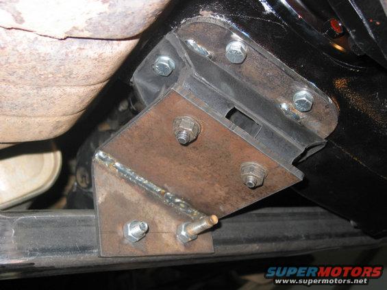 205mount.jpg Mount for NP205. The tranny mount is welded to the new 1/4 inch access cover, then the cover is attached with longer bolts.