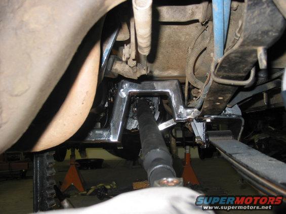 Clearance for front drivshaft through tunnel.