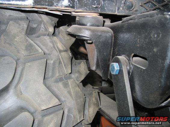 fronttire2spring.jpg At full lock, the front of the tire is also hard into the spring. Have to adjust the steering stops.