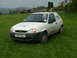 2001 Ford Fiesta - White Ford van with BT logo parked on a grassy hill.