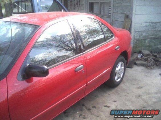 Red 2005 Chevrolet Cavalier sedan, side view