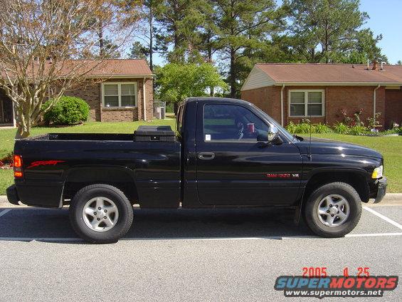 Black 1997 Dodge Ram pickup truck parked in a lot