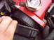 1997 Ford Probe - Engine timing belt with red cover visible.