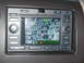 1997 Ford Expedition - The car's navigation system displays a map with street grid and current location marker.