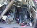 1998 Volkswagen Jetta - The interior of a car is filled with various automotive parts, obscuring the view of the vehicle itself.