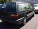 1998 Volkswagen Jetta - Rear view of a black wagon, identified as a Passat GLX, with another vehicle visible in the background.