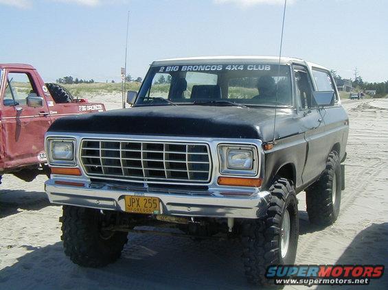 Front view of a 1978 Ford Bronco with off-road tires and a "2 BIG BRONCOS 4X4 CLUB" sticker